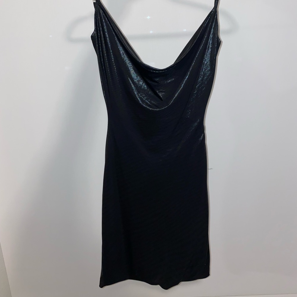 Reflective form hugging black dress